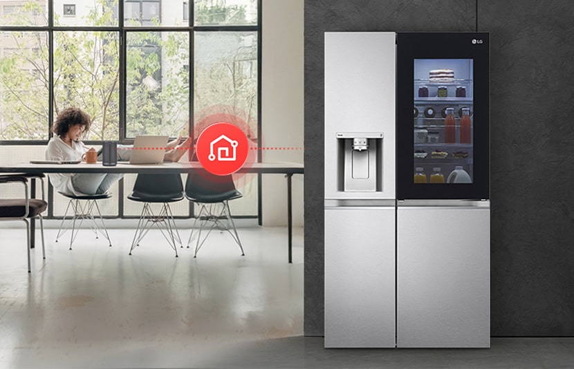 LG fridge freezer connected with smart home control via LG ThinQ app in a modern interior.
