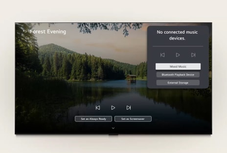 LG ART TV:s LG Gallery+ med BGM och Musik Lounge visar skogssjön "Forest Evening" på skärmen, med en synlig UI-panel för Musik Lounge för stämningsmusik, Bluetooth-uppspelning och kontroller.