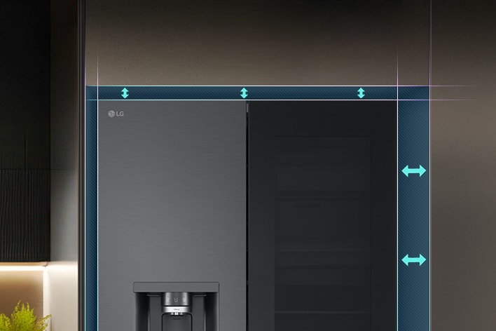 Close-up of white LG washing machine with arrows indicating recommended top and side clearance space for installation