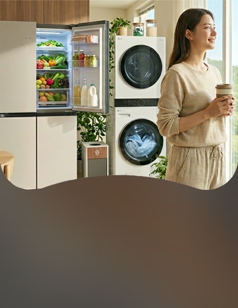 LG refrigerator open with fresh produce in a bright natural wood kitchen, beside a large window with plants and soft daylight.