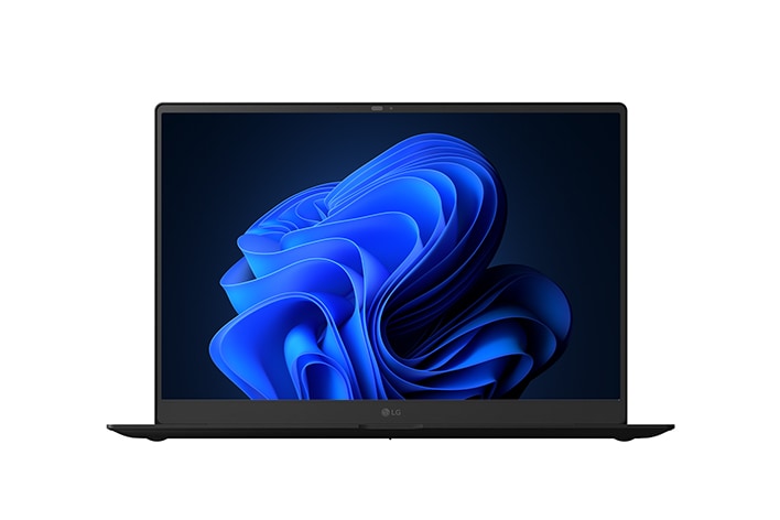 Front image of laptop with Copilot+ Bloom wallpaper