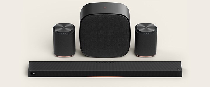 LG Immersive Suite 7 Pro home theater speaker set with a Sound Suite soundbar, a pair of speakers, and a woofer.
