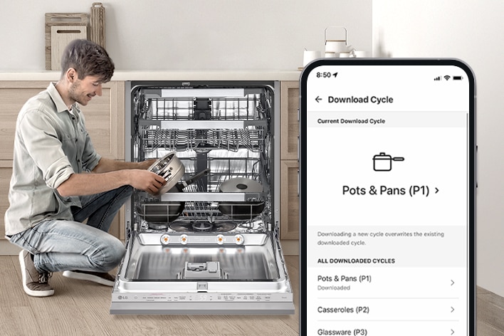A man is holding a pot next to a dishwasher while a smartphone displays a pots cycle on the ThinQ™ app. 