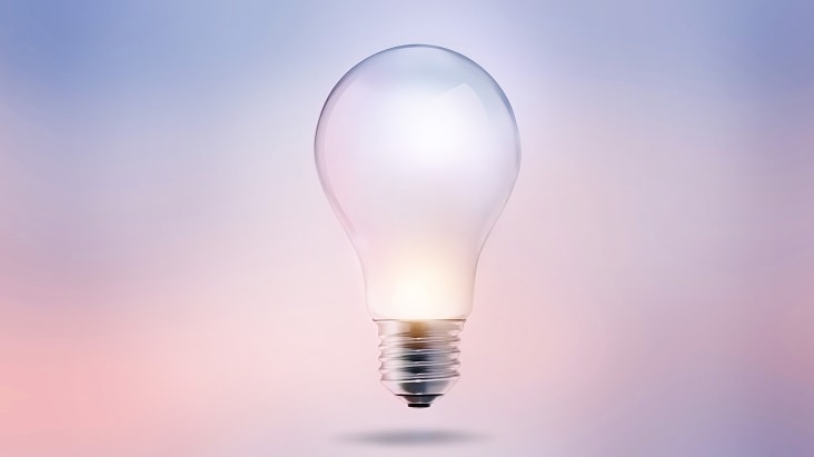 Glowing light bulb representing tips for using LG smart refrigerator