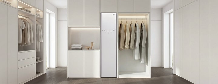 LG washing machine in a built-in space with side clearance highlighted for measurement.