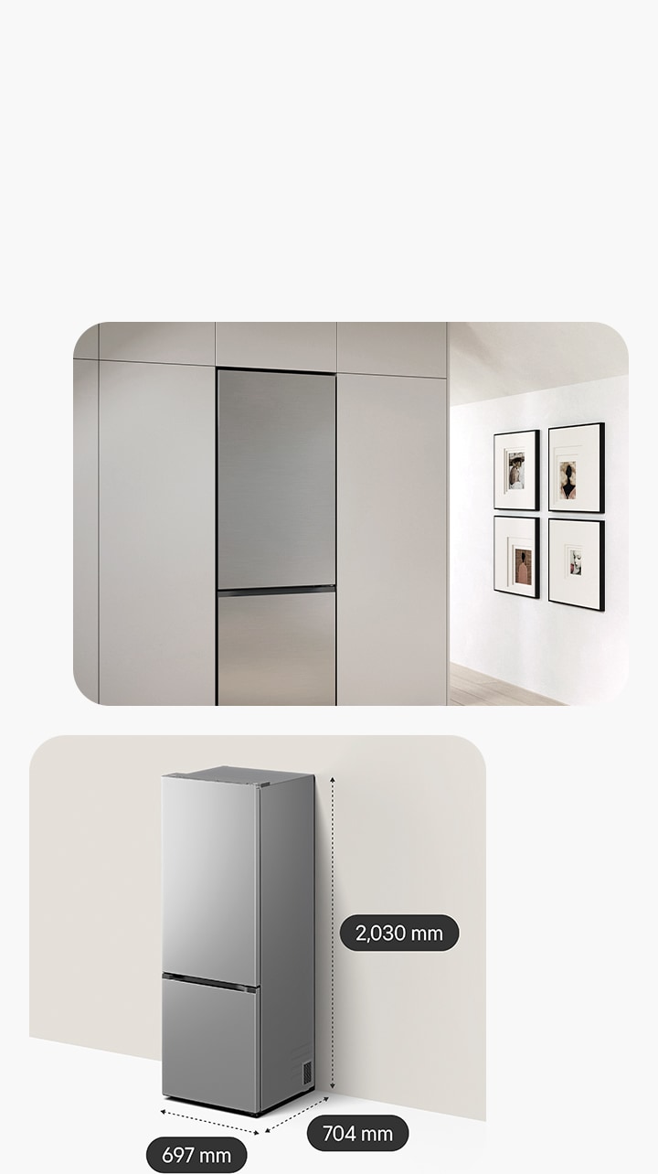 LG silver tall fridge freezer installed within bright white kitchen cabinetry with framed artworks on the wall.	