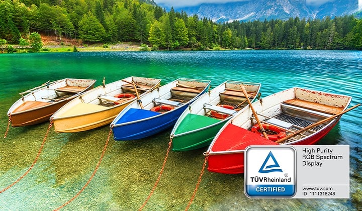 LG Mini RGB evo AI MRGB9M highlights its TÜV Rheinland Certified High Purity RGB Spectrum Display that delivers more accurate color expression by displaying a landscape scene of a row of colorful boats on a lake.	
