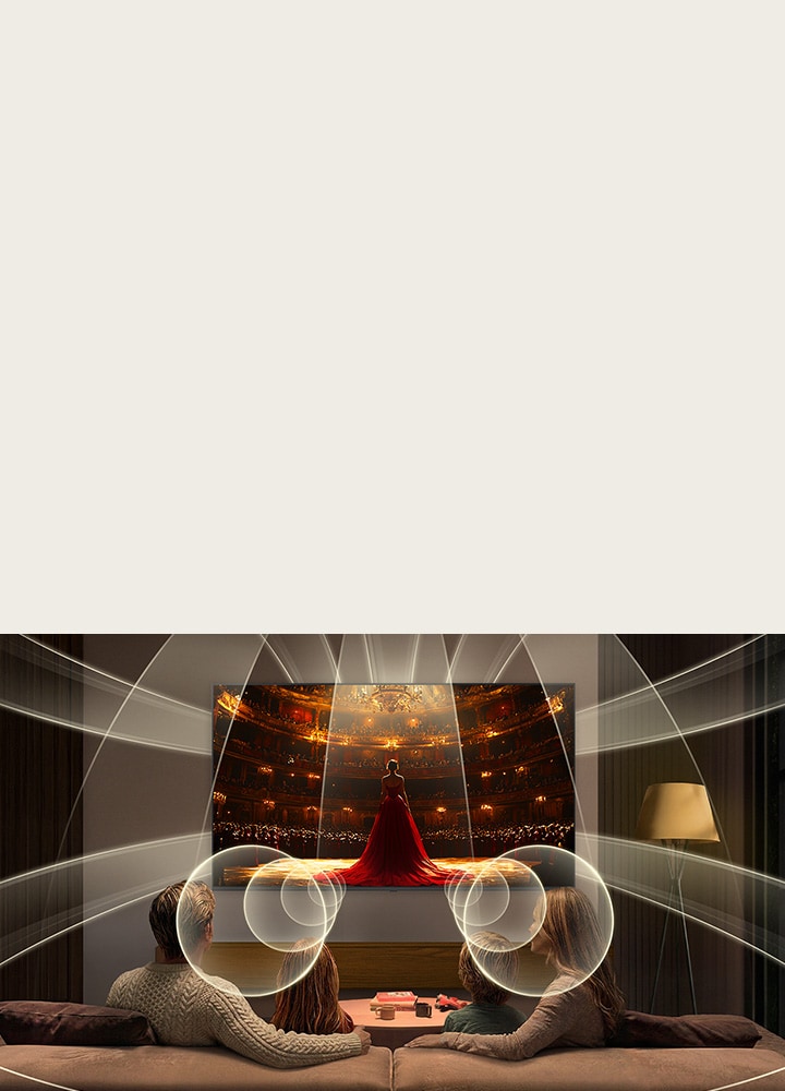 LG QNED evo AI QNED80 Mini LED with Virtual 9.1.2 Ch fills a modern living space as an opera performance plays on screen, delivering multi-directional sound that surrounds the seating area and enhances immersion throughout the room.