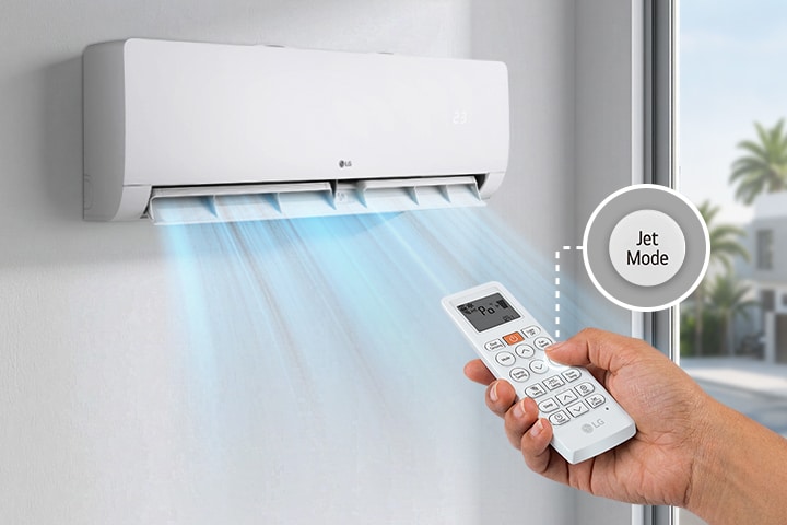 Máy điều hòa treo tường thổi ra luồng khí mát trong khi tay kia điều khiển từ xa với tính năng Chế độ Phản lực (Jet Mode).