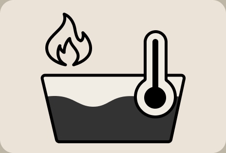 Biểu tượng hướng dẫn nhiệt độ giặt LG cho thấy cài đặt giặt nước nóng với ký hiệu nhiệt kế và vải