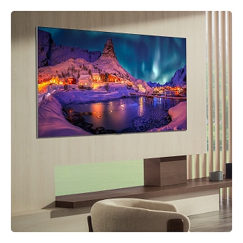 LG OLED evo AI G6 is flush-fit wall-mounted in a modern lifestyle living room, displaying a vivid aurora over a serene coastal village, resembling a framed picture on the wall.