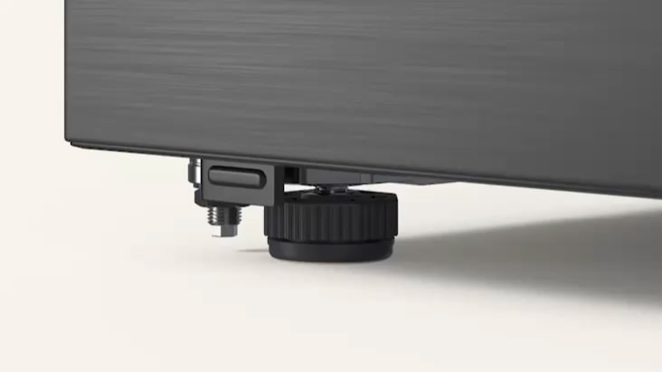 Close-up of LG Fridge Freezer adjustable leveling foot for stable installation.