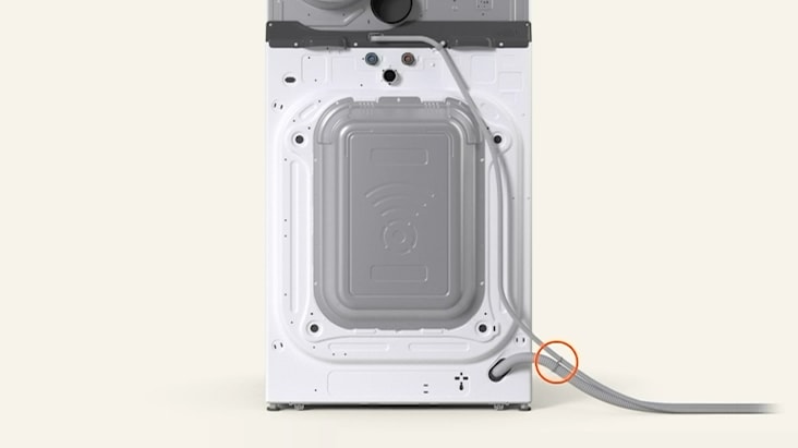 Rear view of LG WashTower™ showing two drain hoses tied together and connected securely