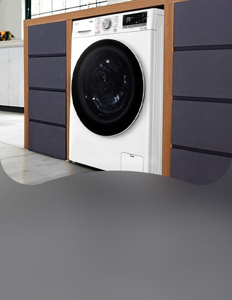 White LG dryer installed in sleek built-in cabinet in a bright laundry space	