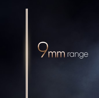 LG OLED evo AI W6 Wallpaper TV with 9mm-range Wallpaper Design highlights its ultra-slim side profile against a dark backdrop, emphasizing seamless integration into the space through its remarkably thin form.