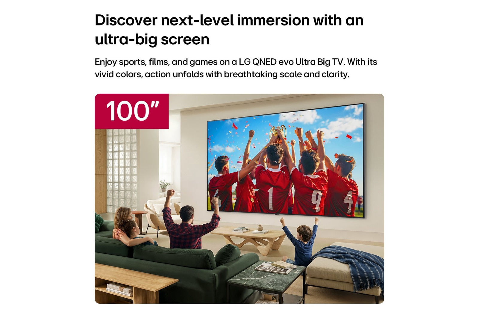 LG QNED evo AI QNED85 Mini LED 100-inch Ultra Big TV is wall-mounted in a living room, displaying a sports victory celebration with vivid colors and refined picture quality across the wide screen as a family cheers together.