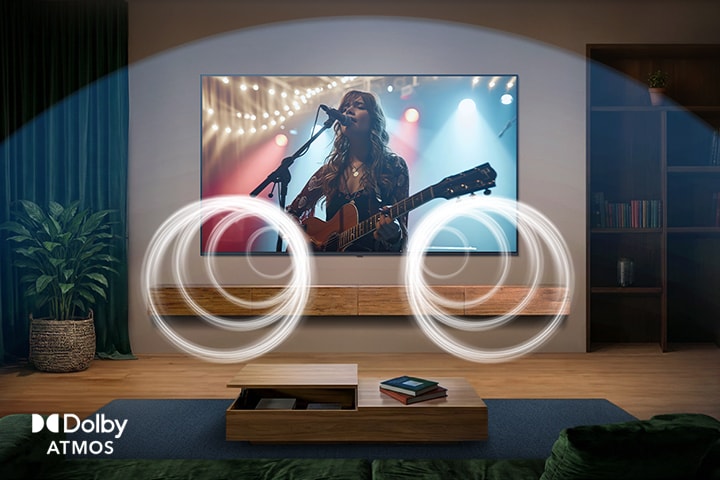 LG QNED evo AI Mini LED with Dolby Atmos shows an artist performing live acoustic music on screen in a living room, with visualized sound waves surrounding the space to indicate immersive, multi-directional, object-based audio.