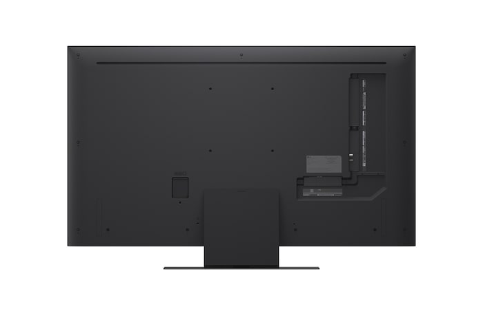 A girl and a dog are seated in front of a LG QNED TV mounted on a wall depicting three elephants walking outwards above a LG Soundbar. The title talks about how every action is more thrilling on a massive screen.
