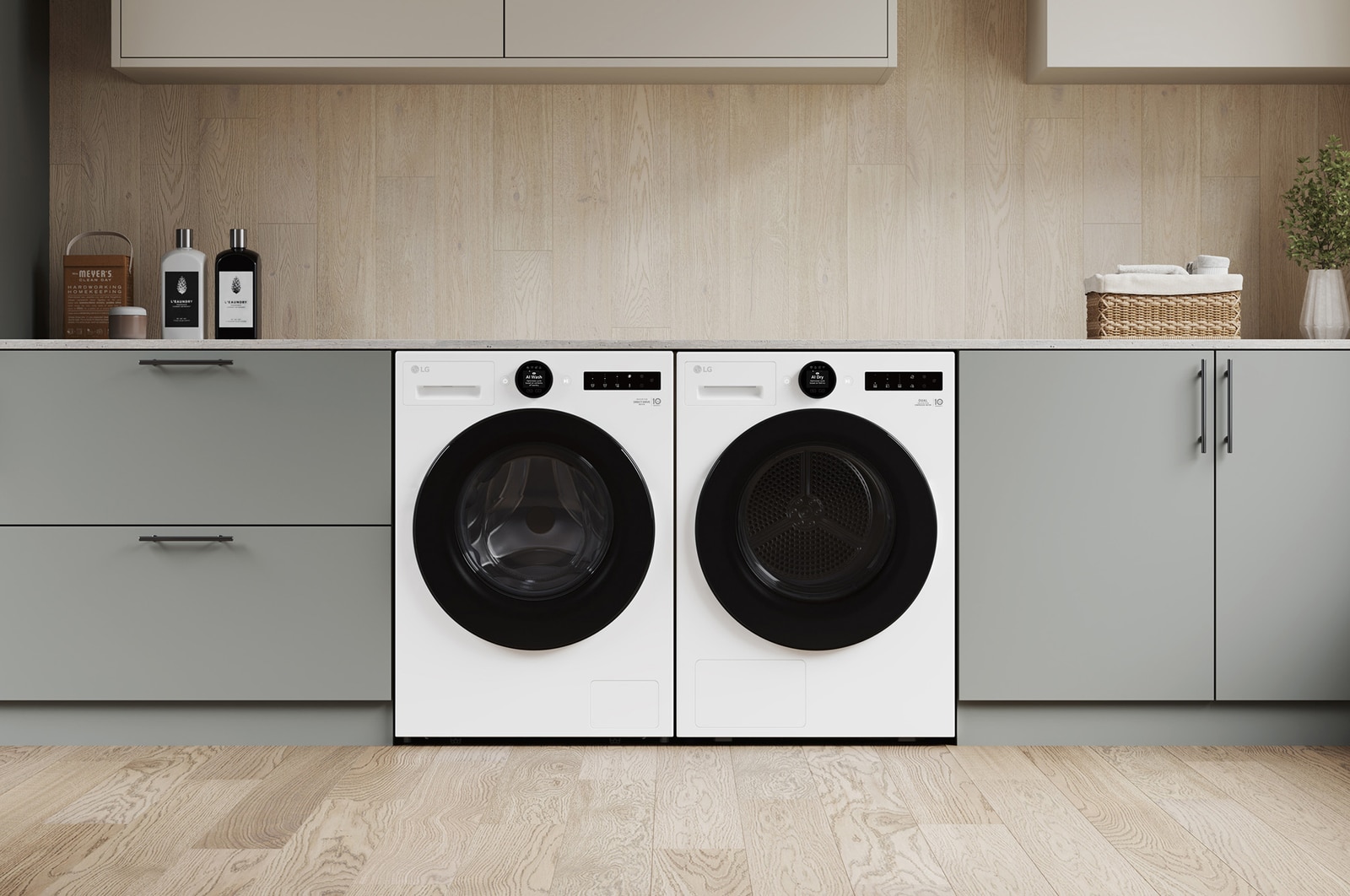 Der weiße LG 9 kg Trockner RT90X8C, als Paar neben einer passenden Waschmaschine in einem modernen Waschraum installiert, mit Energieeffizienzklasse B.