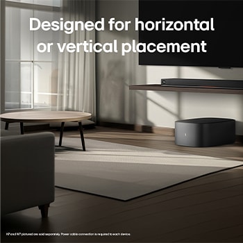 LG Sound Suite W7 woofer placed below a TV with a soundbar, showing easy wireless sound expansion for an immersive home stereo audio system