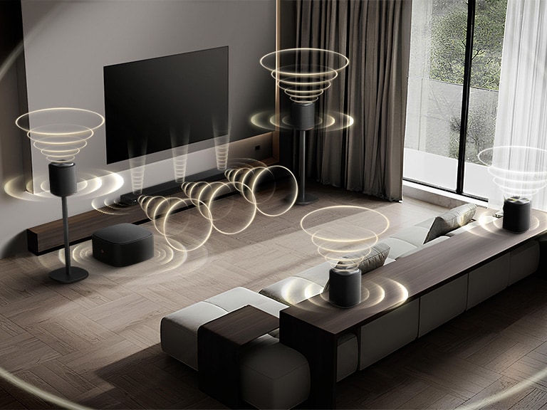 A living room with LG Sound Suite speakers, a soundbar and a woofer emitting pulsing sound waves to create a Dolby Atmos home theater system