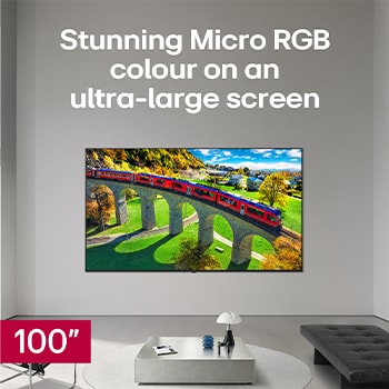 LG Micro RGB evo AI MRGB95, offering up to 100 inches, is wall-mounted in a spacious modern living room. Displaying a vivid, colourful landscape that highlights rich colour and fine detail, elevating the interior to a new level. 