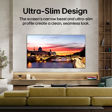LG OLED evo AI C6 is wall-mounted in a styled living space, featuring an ultra-slim design with narrow bezels, and it displays a riverside cityscape at sunset on screen. 