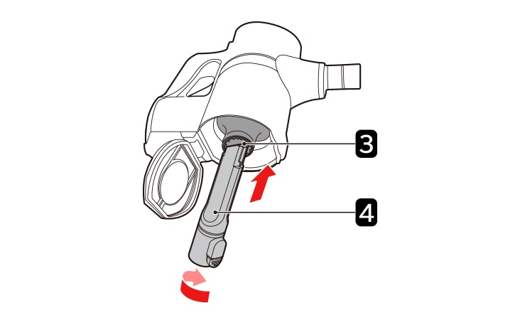 A person inserts the crevice tool into the cyclonic mesh filter and turns it counterclockwise to detach and remove the filter from the vacuum cleaner