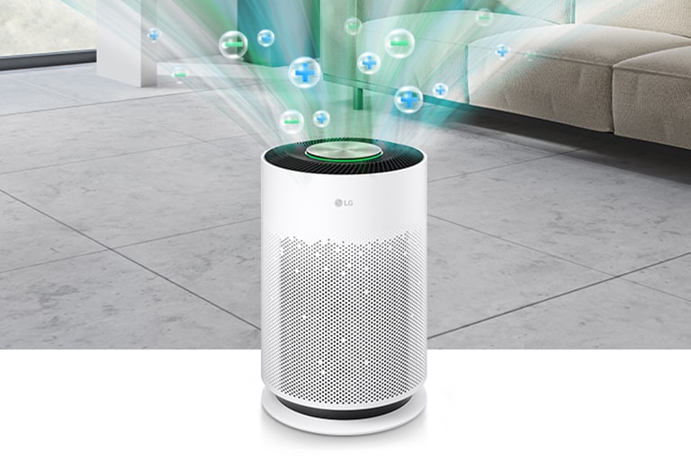 At the top of the air purifier, the air is released and bubbles representing  /- ions are displayed.