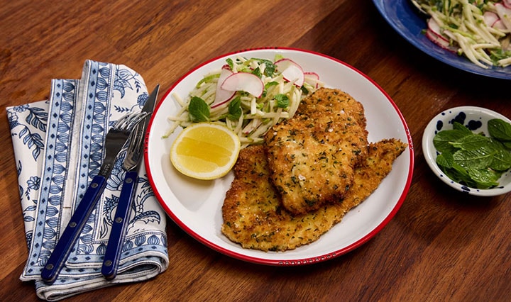 A white humanoid robot, representing the evolution of technology from bulky to sleek, modern, and interconnected devices.