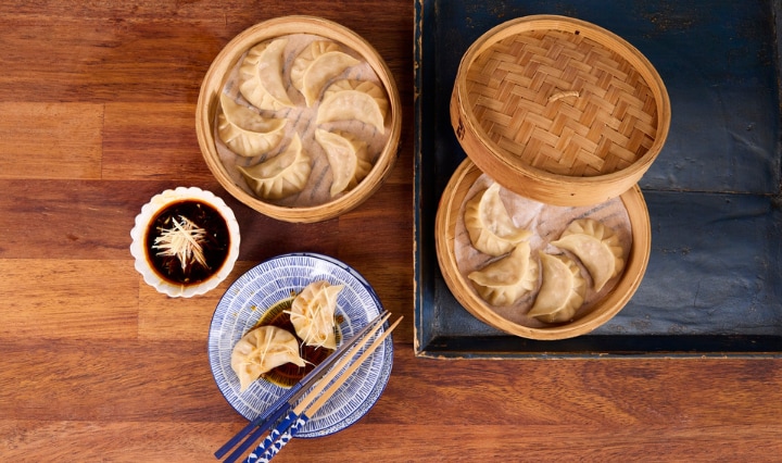 A white humanoid robot, representing the evolution of technology from bulky to sleek, modern, and interconnected devices.