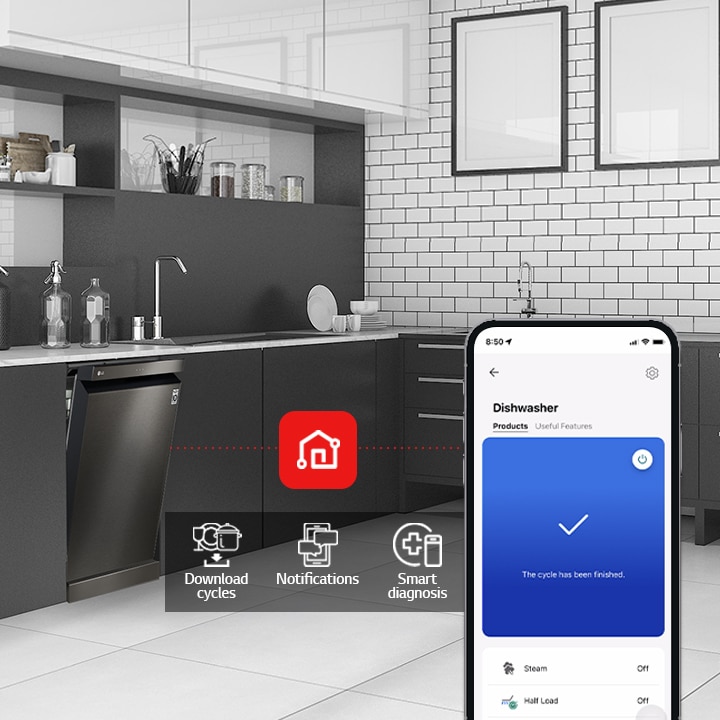 Kitchen interior with partially open free-standing dishwasher and LG ThinQ™ app showing cycle complete notification.