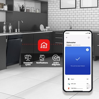 Kitchen interior with partially open free-standing dishwasher and LG ThinQ™ app showing cycle complete notification.