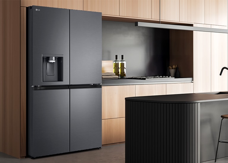 Modern kitchen interior with InstaView fridge.