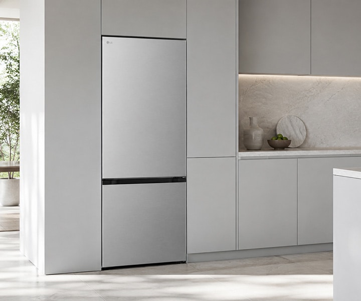 LG stainless fridge freezer (GB-B400PS) built into grey kitchen cabinetry with wine cellar on left and range with utensils on right