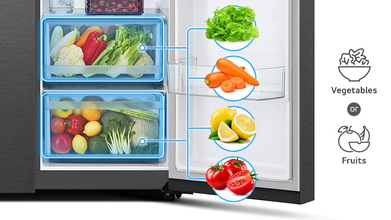 An image showing 2 bottom drawers in the fridge, filled with vegetables and fruits.	