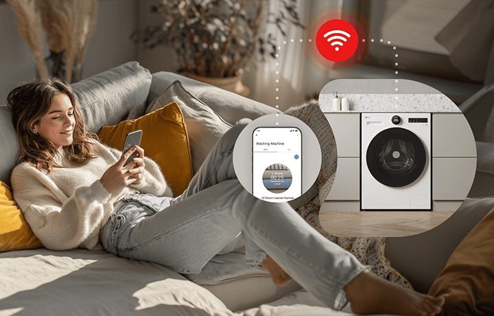 Woman relaxing on sofa using LG ThinQ app on smartphone to remotely control and monitor washing machine, showcasing Wi-Fi connected smart laundry experience at home.
