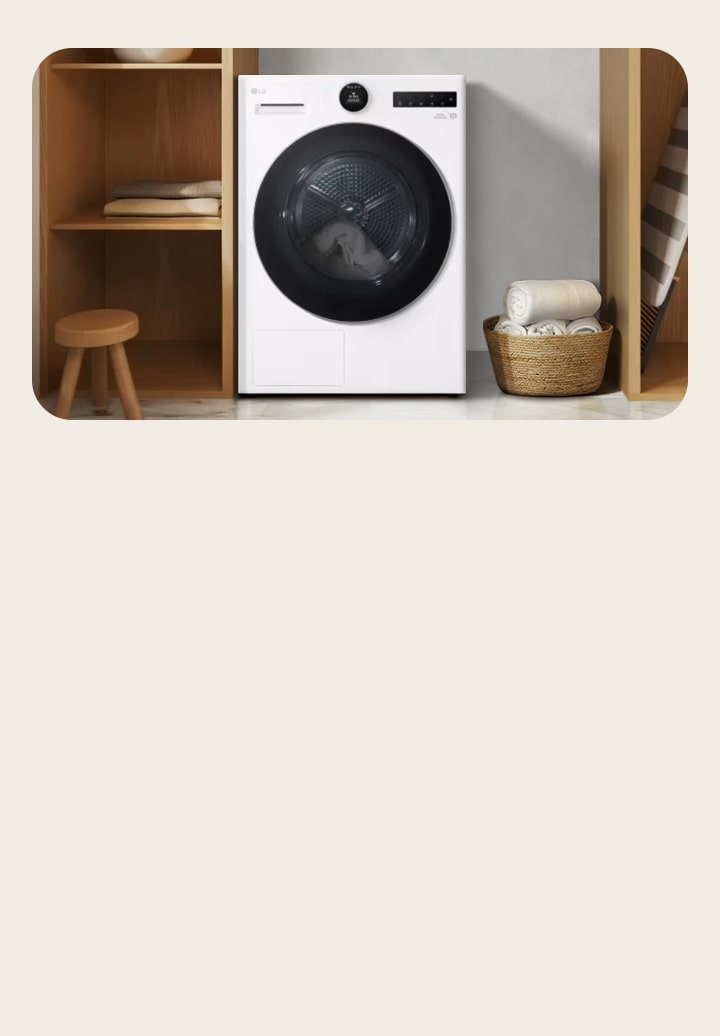 LG white dryer placed in wooden utility shelving with towels and a laundry stool. AI DD sensor detects fabric type and dries towels to a soft finish.	