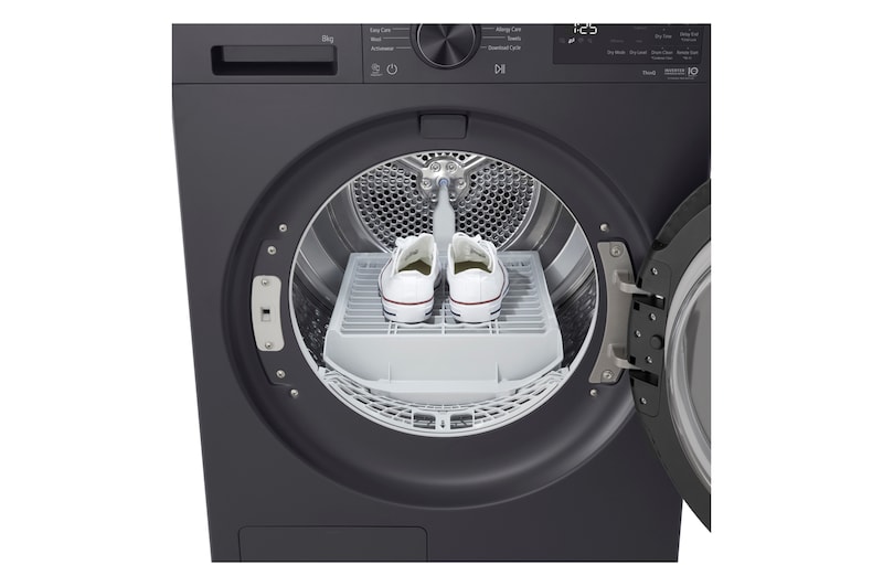 LG DXH3 Heat Pump Dryer with front door open, showing the drum interior.