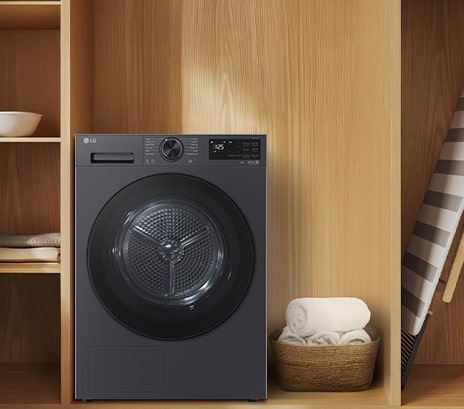 Image showing the front view of the LG Dryer in a premium wood-toned interior