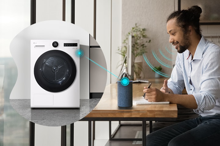 A man controlling the LG dryer with voice assistant via a speaker.