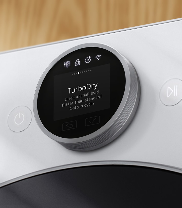 Close-up image of an LCD dial showing the 'TurboDry' cycle name	