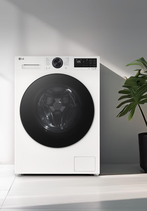 Front-load washing machine placed in a modern laundry space