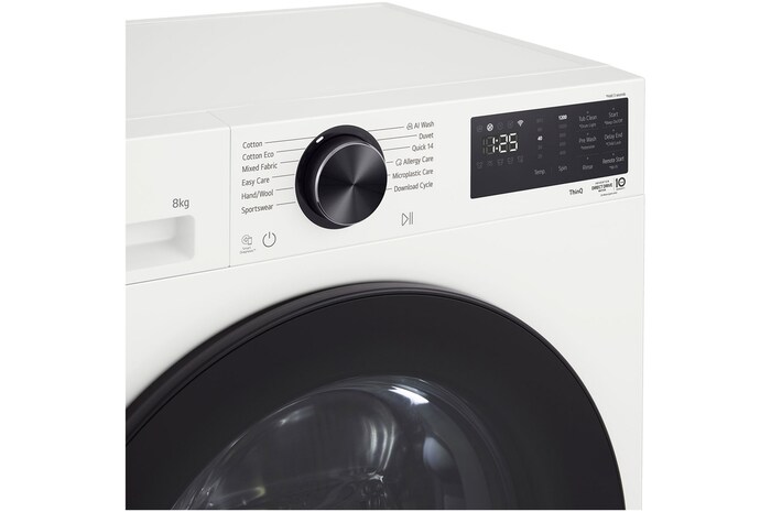 LG Series 3 Front Load Washing Machine right angled close up with door open showing stainless steel drum interior