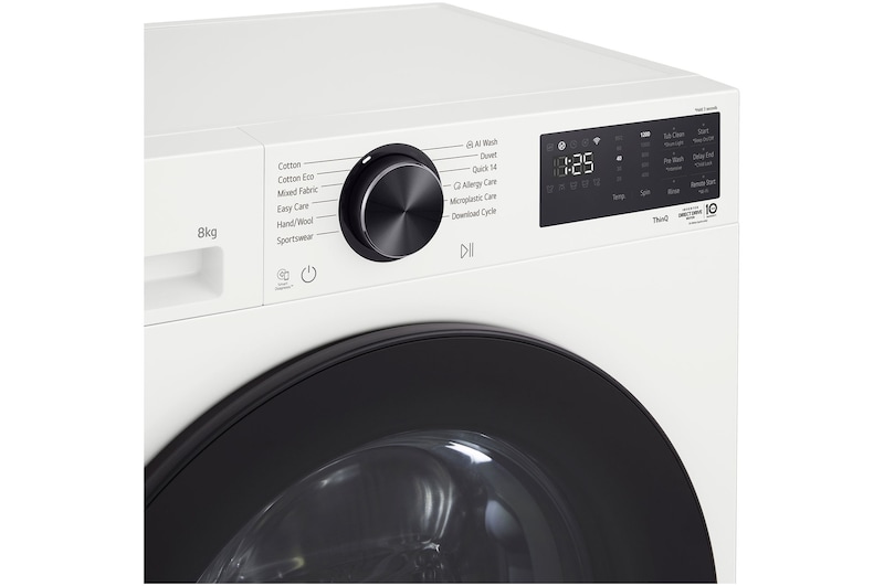 LG Series 3 Front Load Washing Machine right angled close up with door open showing stainless steel drum interior