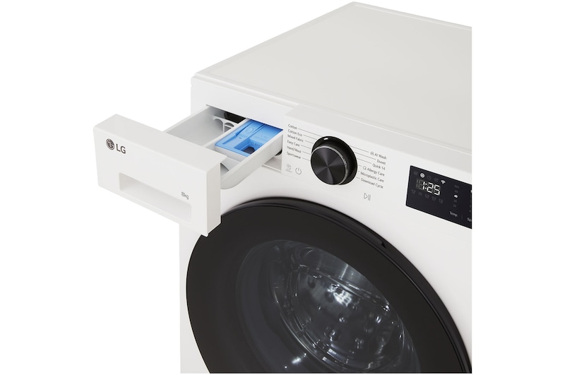 LG Series 3 Front Load Washing Machine right angled top overhead detergent drawer pulled open showing detergent and softener compartments in a front load washer unit