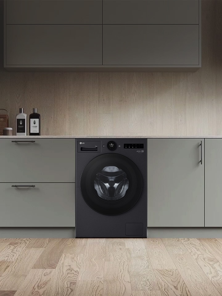 The washing machine is zoomed in. The screen changes and the side of the panel appears.
