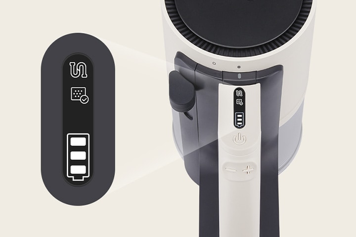 Close-up shot of thumb touch control panel showing battery status.