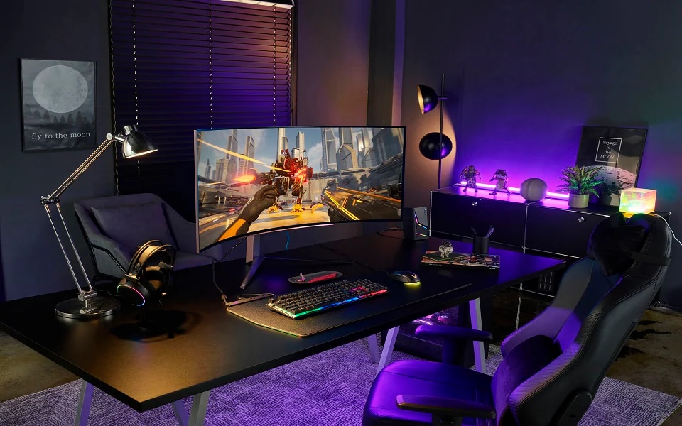 Immersive gaming setup featuring a large LG curved monitor with vibrant colours, RGB lighting, and ergonomic seating ideal for long gaming sessions.