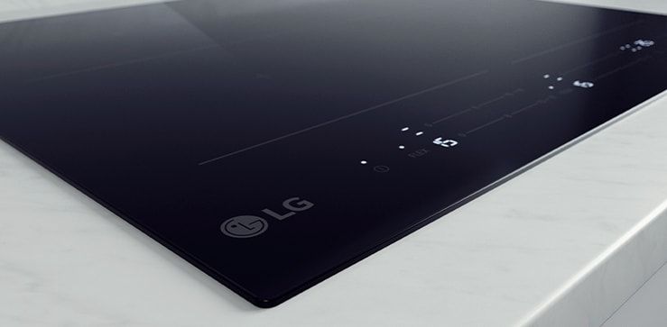 The white LED lights of the induction cooktop.